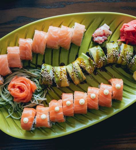Sushi And Rolls With Salmon Prawn Avocado Cream Cheese Stock Image