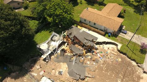 New Photos Show Devastation Caused As Huge Sinkhole Swallows Homes In