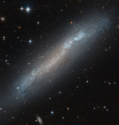 Hubble Spies Barred Spiral Galaxy Edge On Astronomy Sci