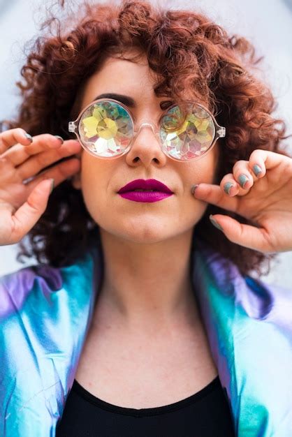 Free Photo Model With Curly Hair And Glasses