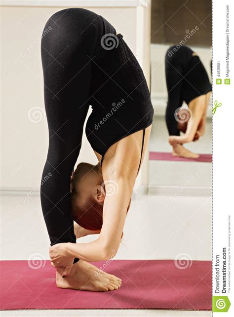 Redhead In Standing Forward Bend Yoga Pose Stock Image Image Of