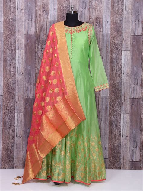 If you want a mix of glam and comfort, then a designer suit is perfect for the wedding season. Green wedding silk attractive anarkali suit - G3-WSS24417 ...