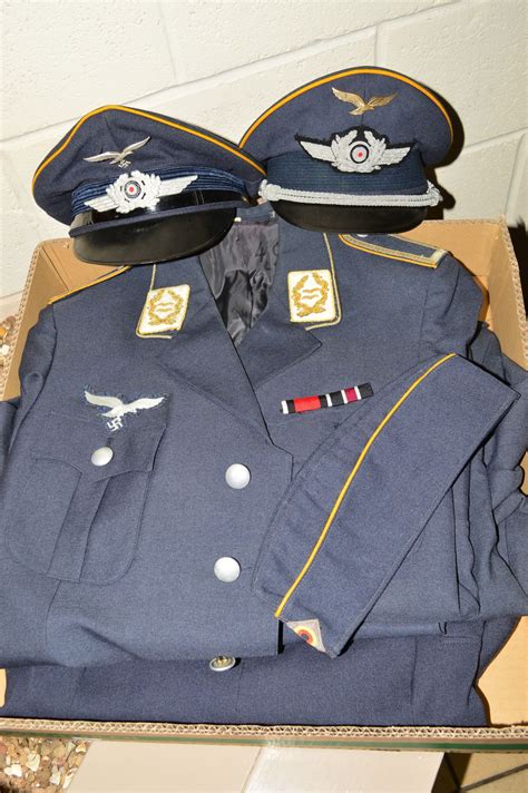 Three Uniform Jackets In The Style Of Wwii German Luftwaffe With