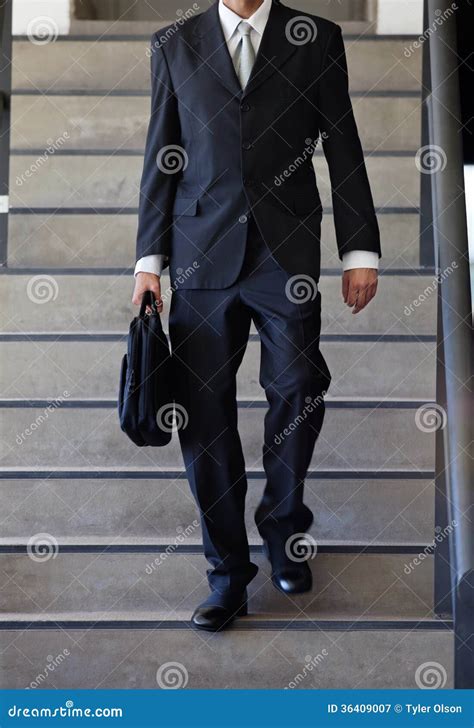 Businessman Walking Down Stairs Stock Image Image Of Person
