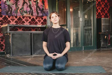 Full Body Horizontal Photo Of A Female New Yoga Teacher Resting In