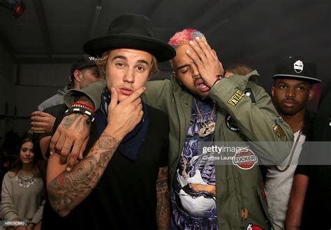 Singers Justin Bieber And Chris Brown Attends The Nylon Midnight
