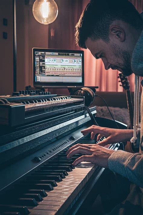 A Man Composer Producer Arranger Songwriter Musician Hands