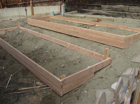Using 2 x 6 lumber, or wider if you prefer, cut two lengths and two widths to make the size bed you want. Pin on Gardens