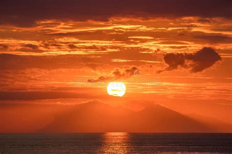 Beautiful Golden Orange Sunset Over The Ocean Stock Photo Image Of