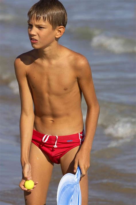 Boys, teens and twinks in speedos and lycra, swimming, diving, on the beach, posing and wrestling. speedo boy