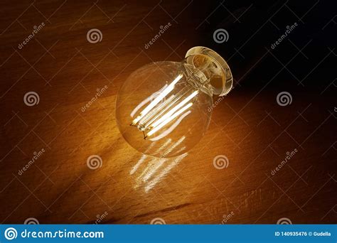 Light Bulb On A Table Stock Photo Image Of Bulb Illuminate 140935476