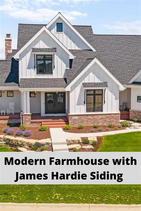 Modern Farmhouse Exterior With Black Windows Vertical Siding Modern