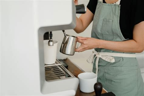 Crop Barista Preparing Coffee In Cafe · Free Stock Photo