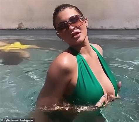Kylie Jenner Sends Temperatures Soaring As She Models A Very Plunging