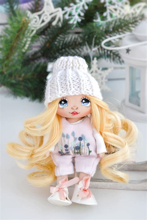 Maybe you would like to learn more about one of these? Blond wavy hair Cloth doll by LiliaArtShop. Tilda Interior dolls with knitted hat and ...