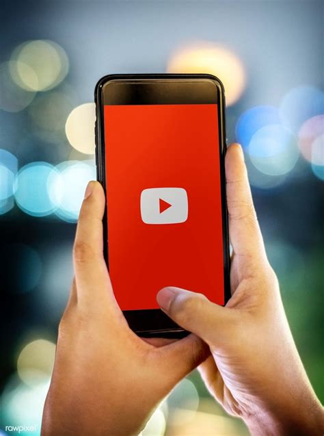 A Person Using Youtube Application On A Mobile Phone Free Image By