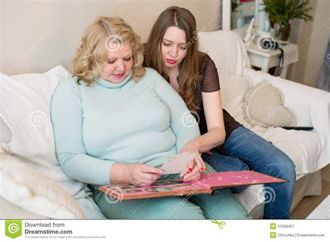 Two Women Looking Photo Album Mother And Daughter Stock Image Image