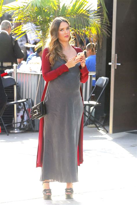 Pregnant Jessica Alba Arrives At Lyft Community Holiday Fiesta In Los