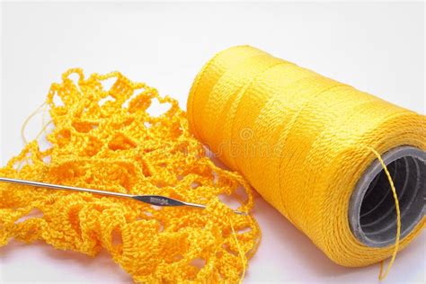 The Reel Yellow Thread And Knitting Isolated On W Stock Photo Image