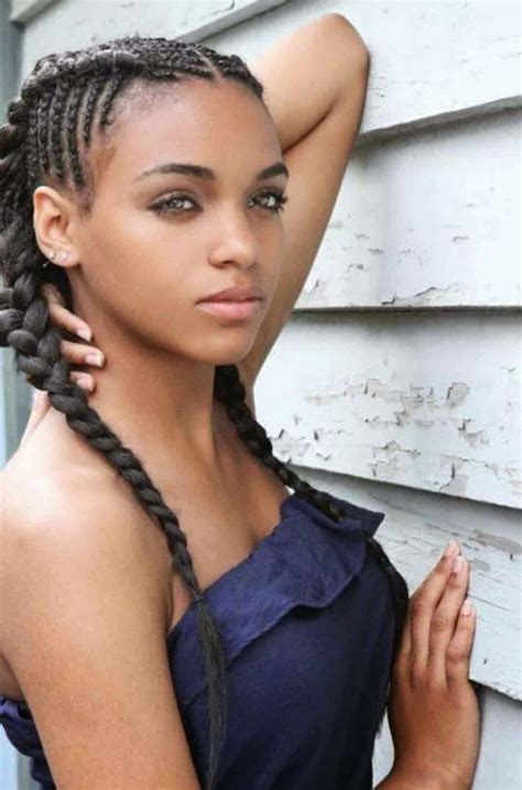 This is a complex braided hairstyle for girls that involves a pony, side parts, loose ends, and wraps. You must see these braided hairstyles for black girls ...