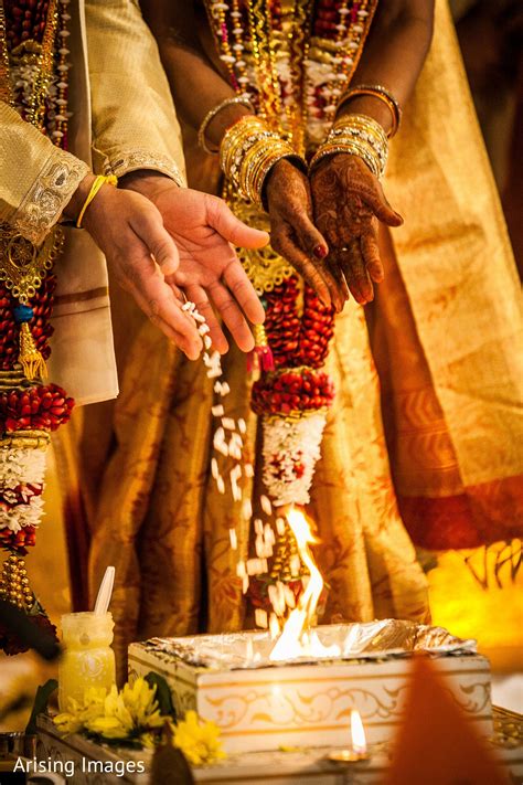 This Indian Bride And Groom Celebrate With A Traditional Event P