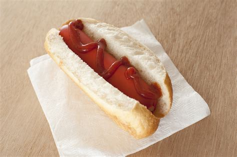 First Person View On Hot Dog With Ketchup Free Stock Image