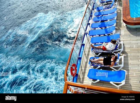 Princess Cruise Ship Passengers Relax On Deck On California Coast