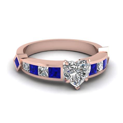 View our heart engagement rings in 360° hd videos. Heart Shaped Diamond Engagement Ring With Blue Sapphire In ...