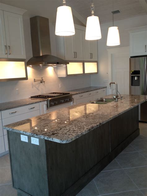 Storing your dishes in base cabinets allows even the grandkids to get in on the action of setting the table. Lighted Upper Cabinets | Upper cabinets, Kitchen, Decor