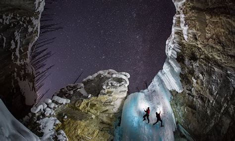 Photographer Braves 30c Temperatures To Capture Ice Climbers Scaling