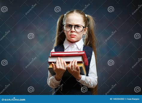 Serious Schoolgirl Wear Glasses Hold Pile Of Book Stock Photo Image