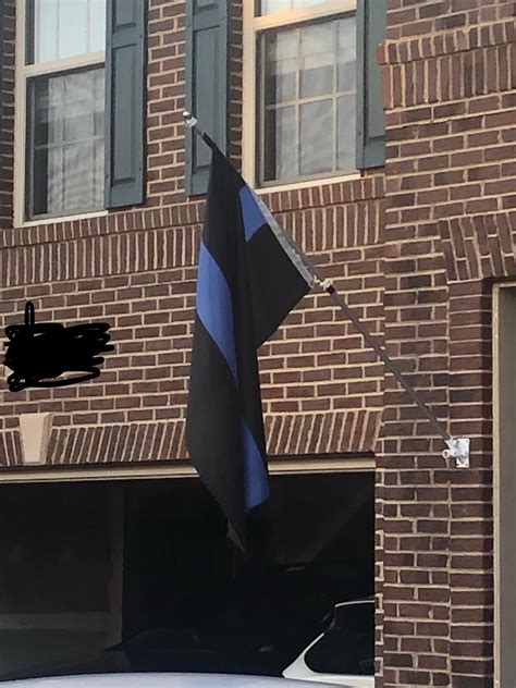 Does Anyone Know What This Flag Means Its A Black Flag With A Blue