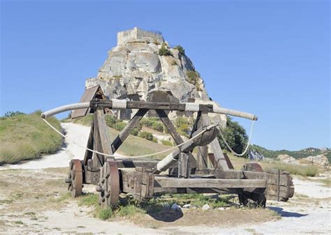 Medieval Catapult In Front Of Hilltop Castle Stock Image Image Of