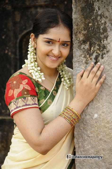 She started her acting career as a child in malayalam films and went on to appear in television serials. Sanusha hot in saree from new tamil movie Acham Thavir ...
