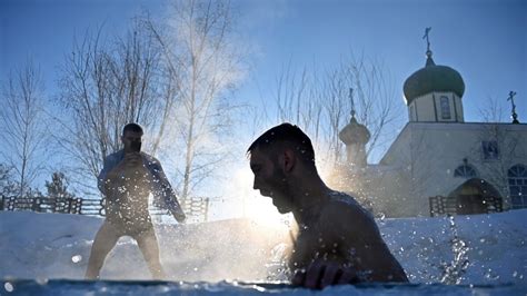 From Minsk To Vladivostok People Plunge Into Icy Waters To Mark Orthodox Epiphany