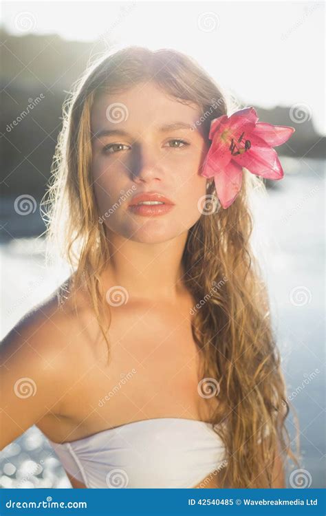beautiful blonde with flower hair accessory on the beach stock image image of blonde