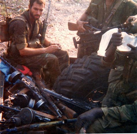 Rhodesian Soldiers With A Large Haul Of Captured Weapons During The