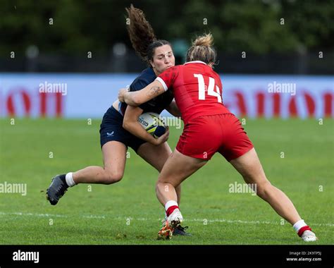 Usas Tess Feury Is Tackled By Canadas Maddy Grant During The Womens