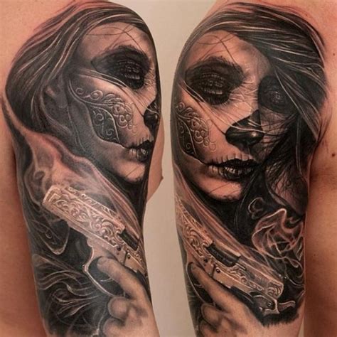 Mexican Traditional Style Black Ink Shoulder Tattoo Of Woman With Pistol Tattooimagesbiz