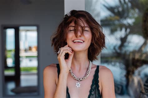 Free Photo Portrait Of Short Hair Brunette Woman With Chain On Neck