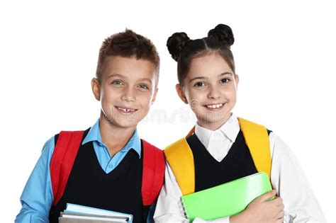 NiÃ±os Felices Con Uniforme Escolar De Fondo Foto De Archivo Imagen