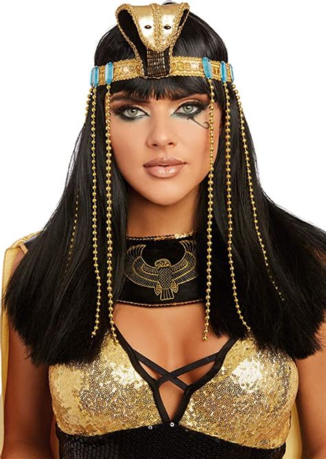 an egyptian woman with long black hair and gold makeup