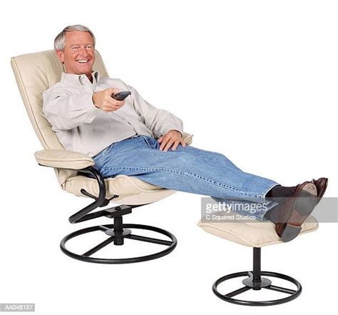 Man Feet Up Watching Tv Photos And Premium High Res Pictures Getty Images