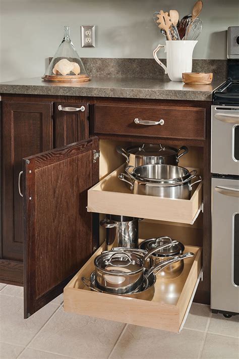 It is easier without the base cabinets in your way. Base Roll Tray Cabinet - Aristokraft Cabinetry