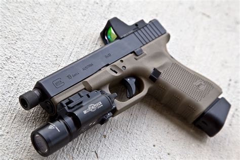 The Glock 9 With A Beam And Extended Clip The Ultimate Weapon