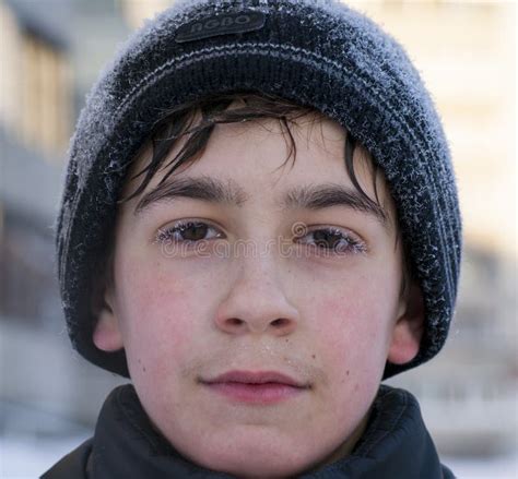 Face Of Young Caucasian Boy In Winter Walking Cold Weather Siberian