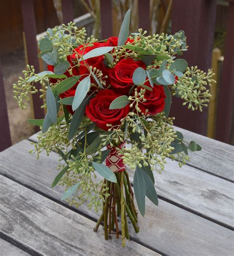 Dozen Red Roses With Seeded Eucalyptus Handtied Bouquet Fiori
