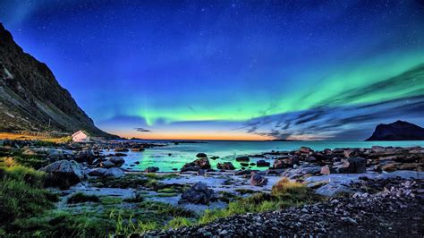 Download 2560x1440 Aurora Borealis Northern Lights Stones Stars