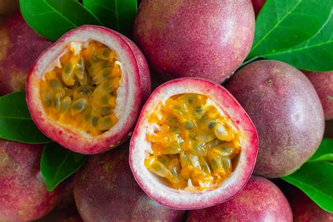 Fresh Passion Fruit On Wood Table In Top View Flat Lay For Background Or Wallpaper Ripe Passion