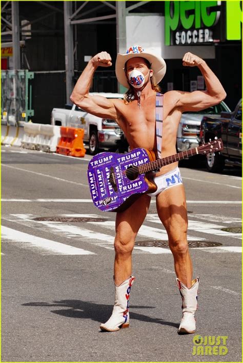 The Naked Cowboy Is Busking In A Face Mask During The Pandemic Photo